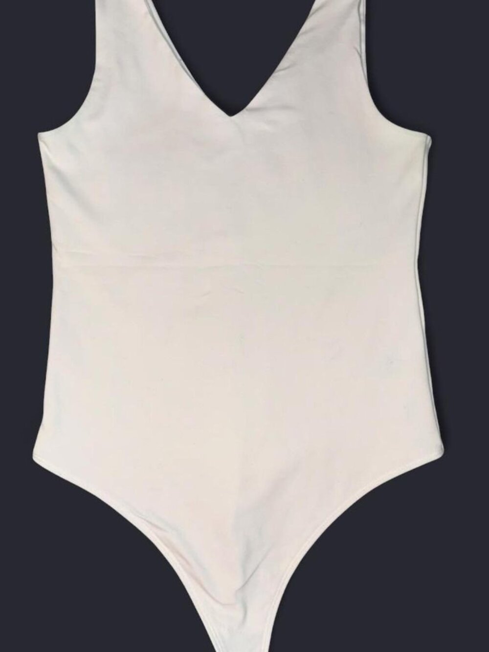 Abercrombie & Fitch White v-Neck Thong Bodysuit. Size Medium